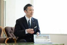 店長　塚本 慎也